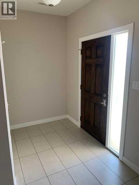 1, 346 Mt Sundance Landing W, Lethbridge, Alberta  T1J 5H9 - Photo 2 - A2303484