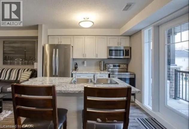 1989 Ottawa Street S Unit# 25e, Kitchener, Ontario  N2E 0G7 - Photo 3 - 40822365