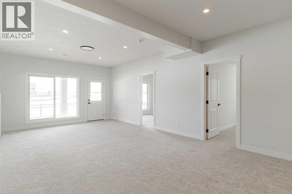 125 Monarch Bend, Rural Rocky View County, Alberta  T3Z 0K4 - Photo 26 - A2302248