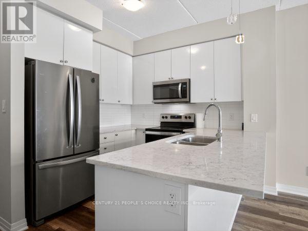 407 - 610 Farmstead Drive, Milton, Ontario  L9T 7W2 - Photo 8 - W13021696