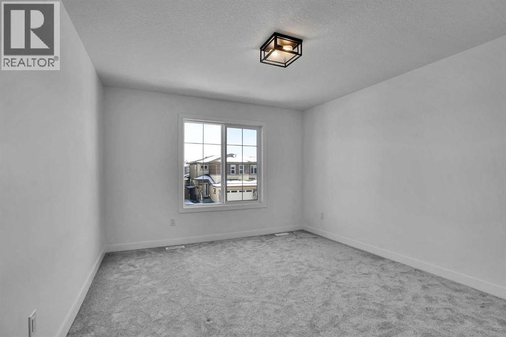 230 Kinniburgh Loop, Chestermere, Alberta  T1X 2S7 - Photo 38 - A2297172