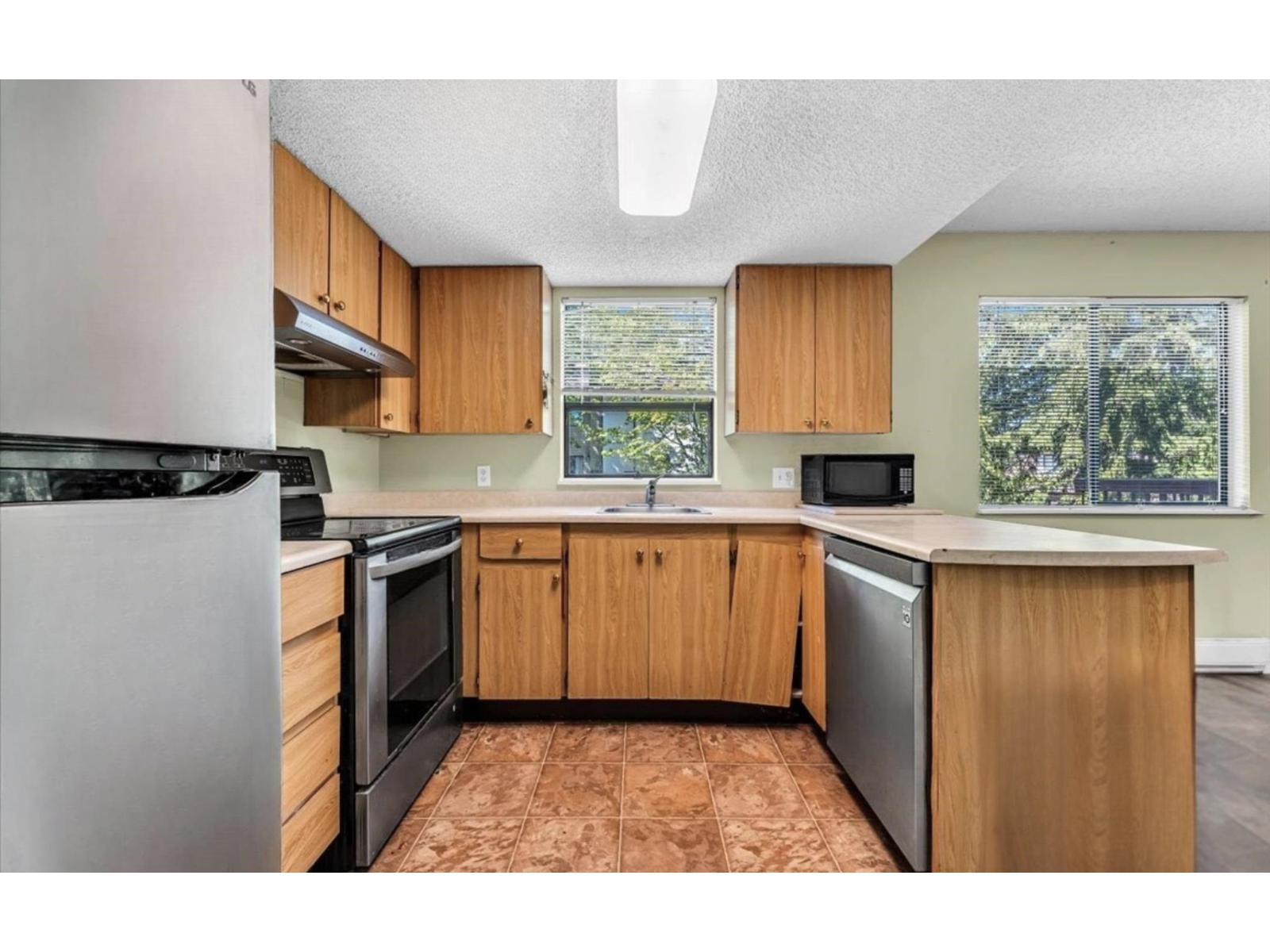 201 13316 71b Avenue, Surrey, British Columbia  V3W 7Z4 - Photo 3 - R3113579