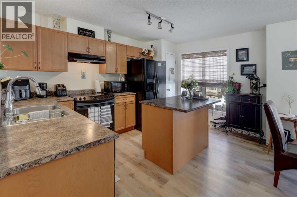 319 Toscana Gardens Nw, Calgary, Alberta  T3L 3C3 - Photo 6 - A2301303