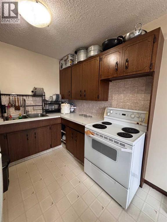 5, 1234 9 Avenue N, Lethbridge, Alberta  T1H 1G7 - Photo 4 - A2303604