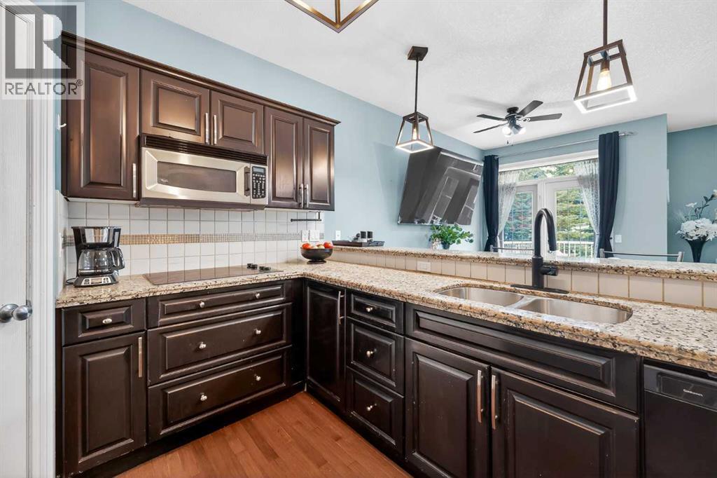 8 Tucker Circle, Okotoks, Alberta  T1S 2J6 - Photo 7 - A2301273