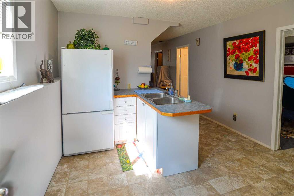 4, 33 Stonegate Drive NW, Airdrie, Alberta  T4B 2V9 - Photo 23 - A2300987