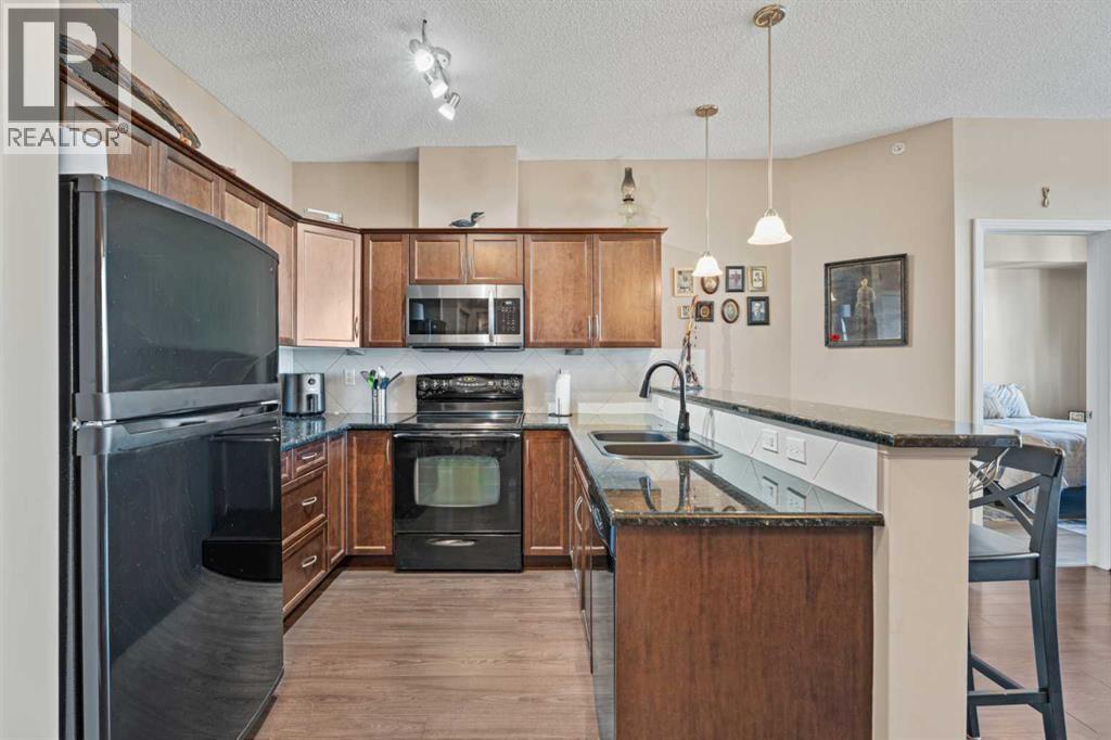 410, 1 Crystal Green Lane, Okotoks, Alberta  T1S 0C5 - Photo 8 - A2300391