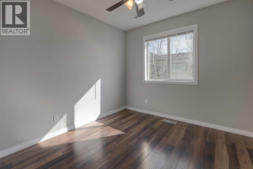 302, 2006 Luxstone Boulevard SW, Airdrie, Alberta  T4B 3C4 - Photo 22 - A2300510