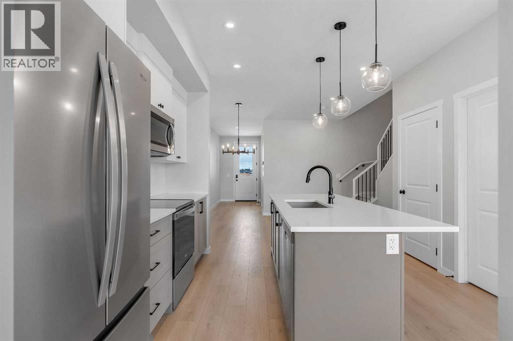 1277 Creekview Drive Sw, Calgary, Alberta  T2X 4Y1 - Photo 12 - A2271942