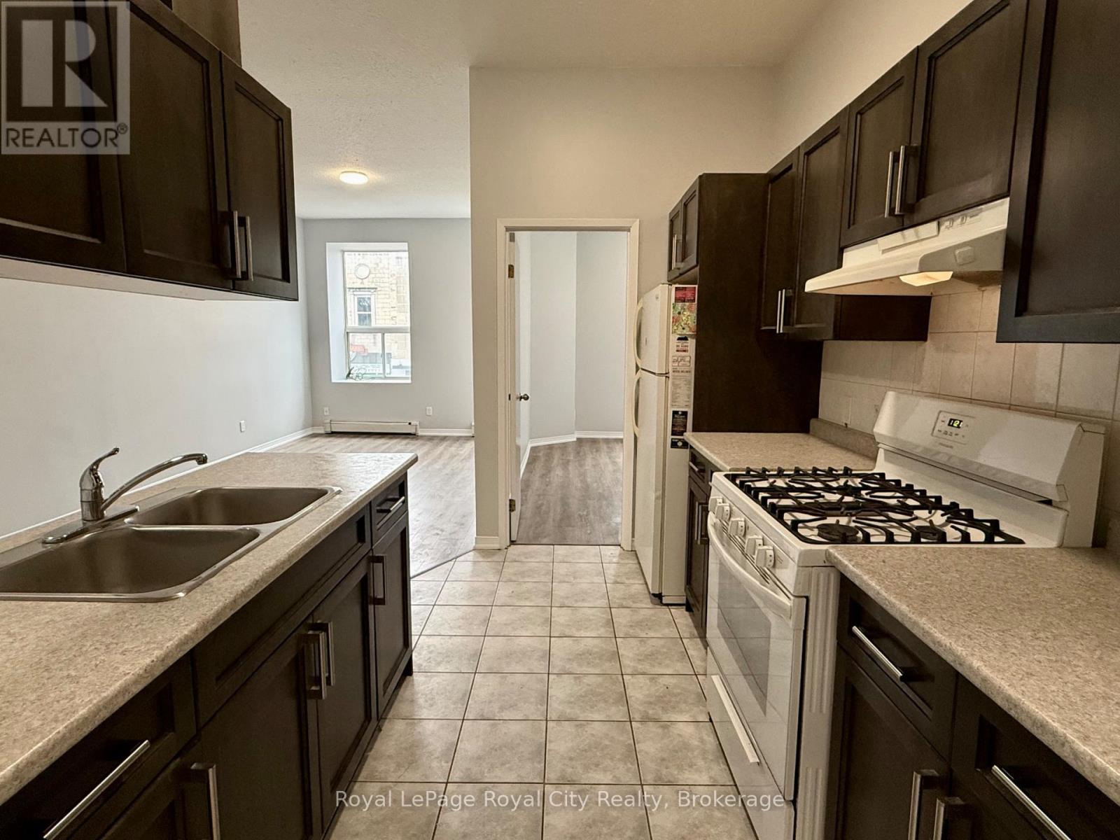 1 - 116 Wyndham Street N, Guelph, Ontario  N1H 4E8 - Photo 1 - X12999172