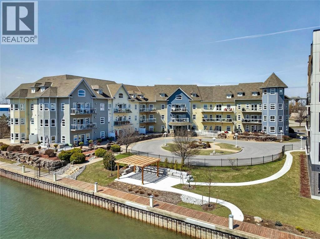 Welcome to 1550 Venetian in Point Edward, where waterfront living meets effortless luxury. Perfect for downsizers & retirees, this 2-bedroom, 2-bathroom condo offers a rare opportunity to enjoy space, comfort & a low-maintenance lifestyle just steps from the St. Clair River, Lake Huron & Bridgeview Marina . The bright, open-concept layout features soaring ceilings, a cozy gas fireplace, a spacious kitchen with a breakfast bar & lots of room to entertain. The upper loft adds extra living space, ideal for an office or a quiet retreat. The primary suite offers a private escape with an ensuite, while the second bedroom is perfect for guests. Step outside to your oversized balcony & take in peaceful views of the marina. This is where mornings feel calmer & evenings feel earned. With underground parking, building amenities & a prime location near walking paths, restaurants & the waterfront, this move-in-ready condo is the perfect blend of lifestyle & convenience. Downsizing doesn’t mean giving anything up, it means upgrading to this. (id:48254)