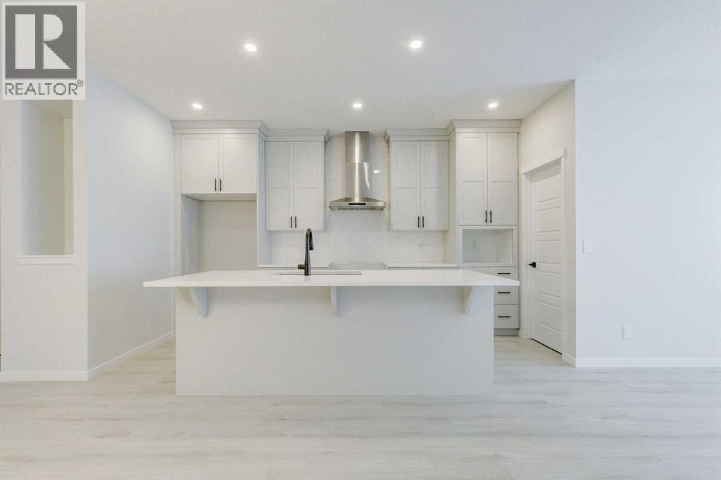 186 Creekside Manor SW, Calgary, Alberta  T2X 6J5 - Photo 3 - A2272147