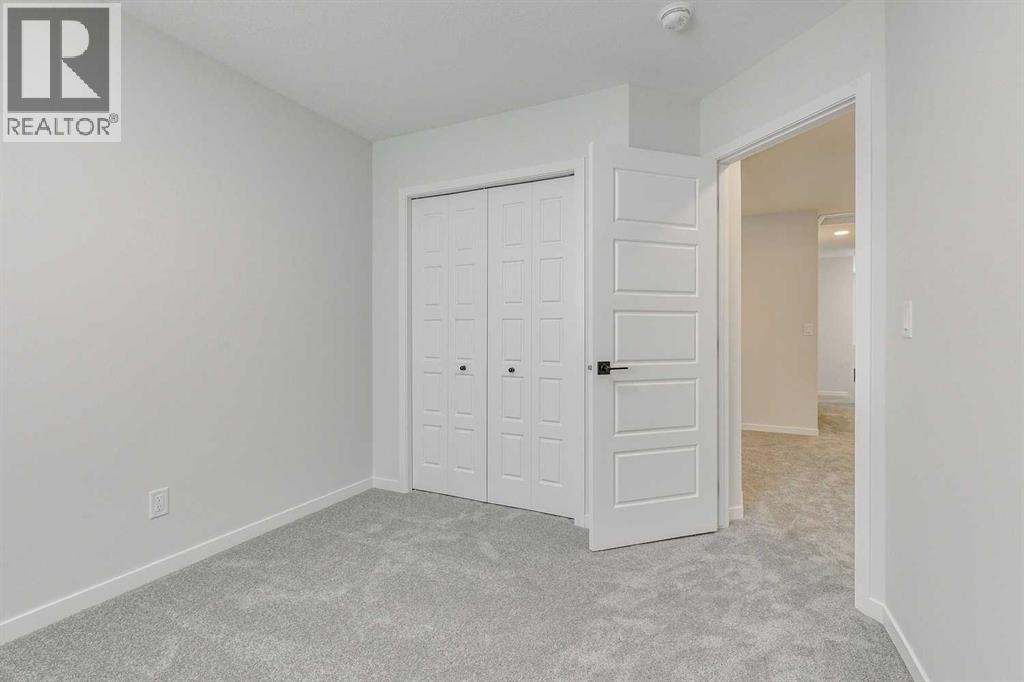 186 Creekside Manor SW, Calgary, Alberta  T2X 6J5 - Photo 31 - A2272147