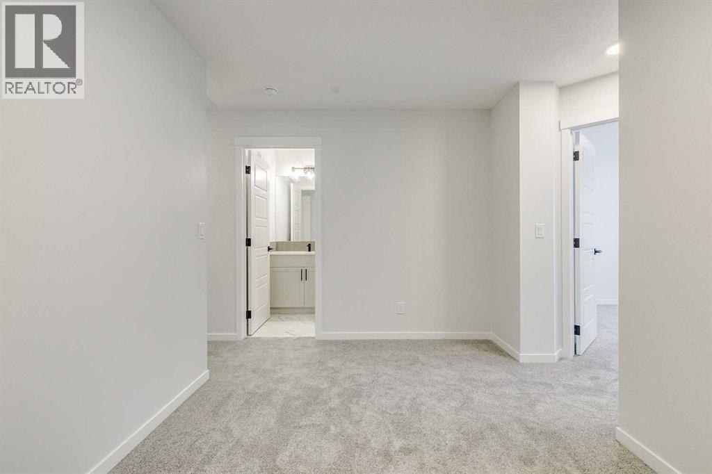 186 Creekside Manor SW, Calgary, Alberta  T2X 6J5 - Photo 28 - A2272147