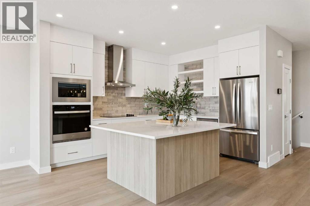 215 Greenwich Drive NW, Calgary, Alberta  T3B 6N9 - Photo 4 - A2277964