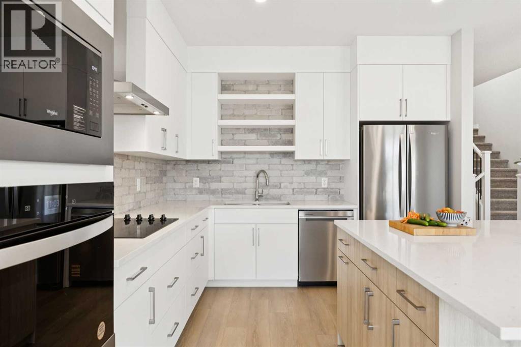 215 Greenwich Drive NW, Calgary, Alberta  T3B 6N9 - Photo 5 - A2277964