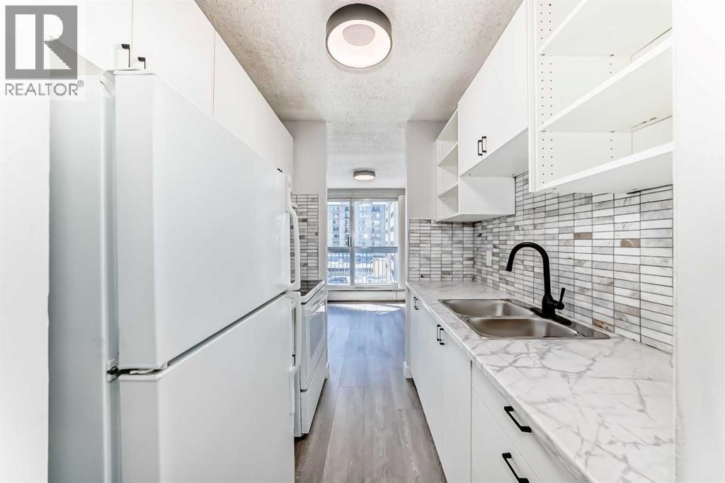 401, 340 14 Avenue Sw, Calgary, Alberta  T2R 1H4 - Photo 3 - A2301349