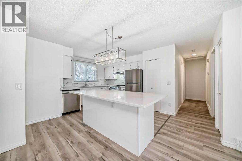 23 Marbank Way NE, Calgary, Alberta  T2A 4A2 - Photo 4 - A2291649