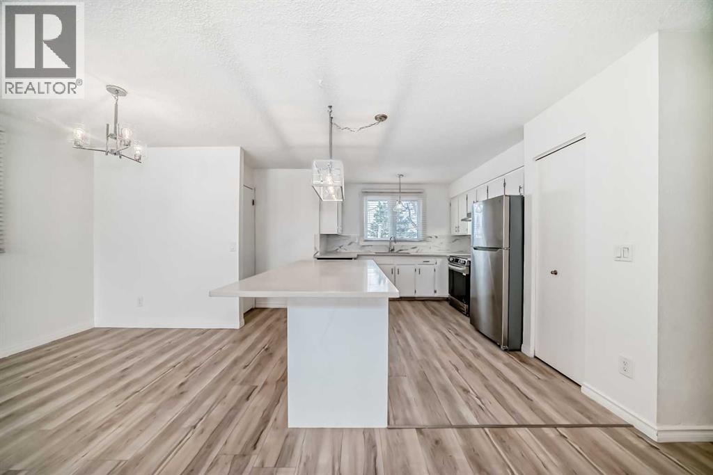 23 Marbank Way NE, Calgary, Alberta  T2A 4A2 - Photo 5 - A2291649