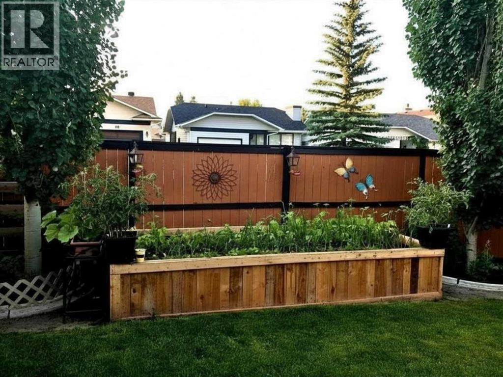 4 Cedargrove Way Sw, Calgary, Alberta  T2W 4V2 - Photo 33 - A2299441