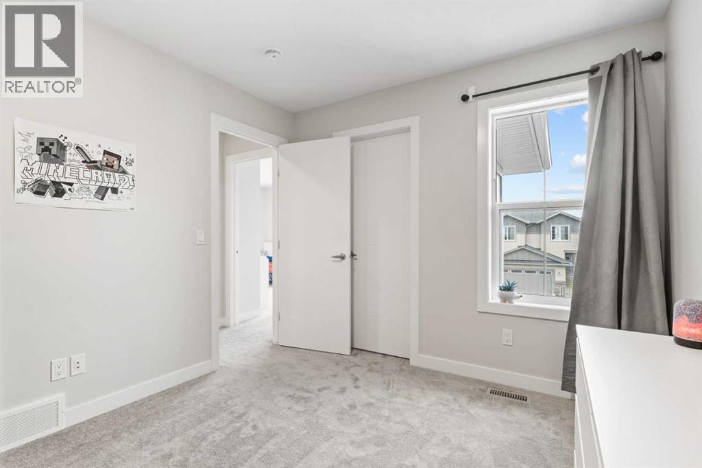 60 Ranchers View, Okotoks, Alberta  T1S 5R6 - Photo 37 - A2296758