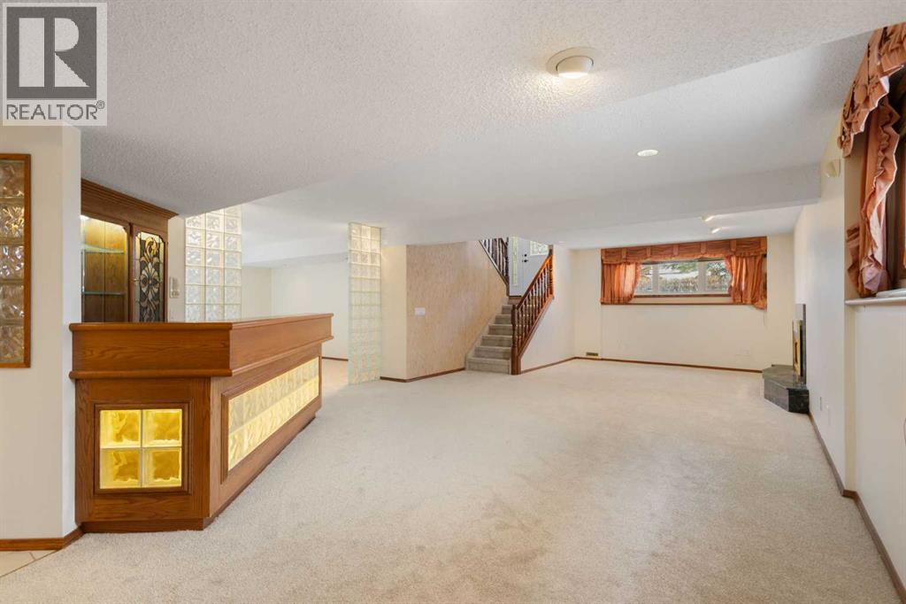 108   Woodmont Drive Sw, Calgary, Alberta  T2W 4M3 - Photo 28 - A2303386