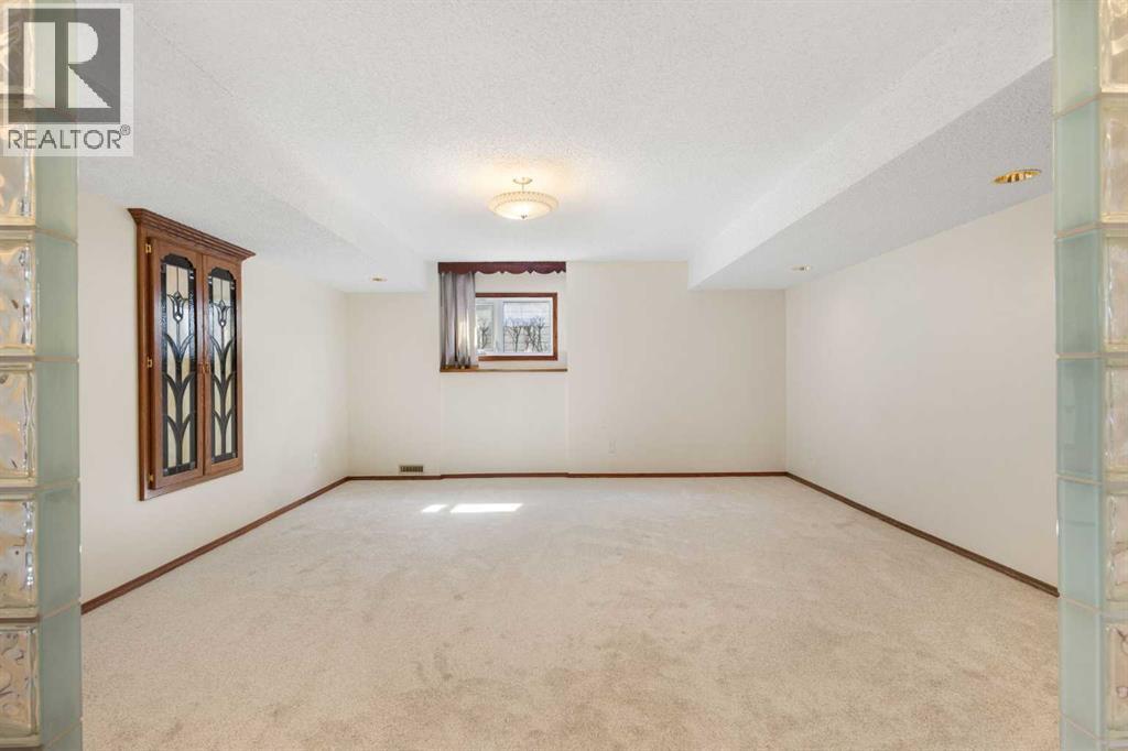 108   Woodmont Drive Sw, Calgary, Alberta  T2W 4M3 - Photo 33 - A2303386