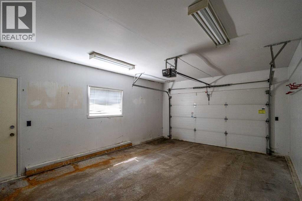 108   Woodmont Drive Sw, Calgary, Alberta  T2W 4M3 - Photo 40 - A2303386