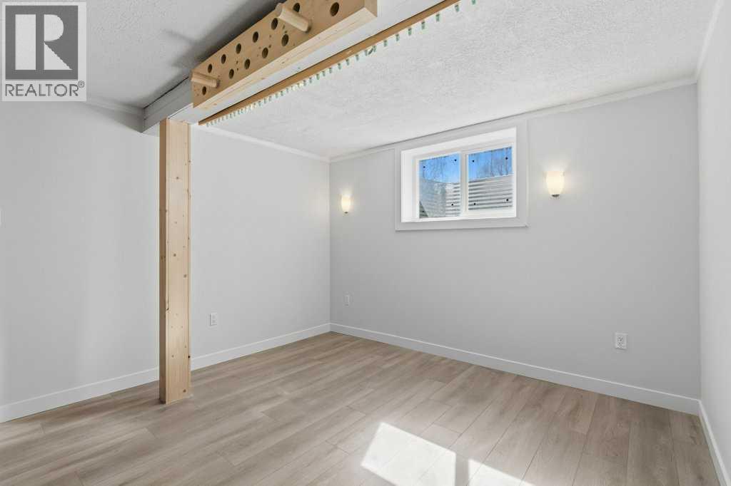 536 Woodhill Place Sw, Calgary, Alberta  T2W 3L5 - Photo 32 - A2299102