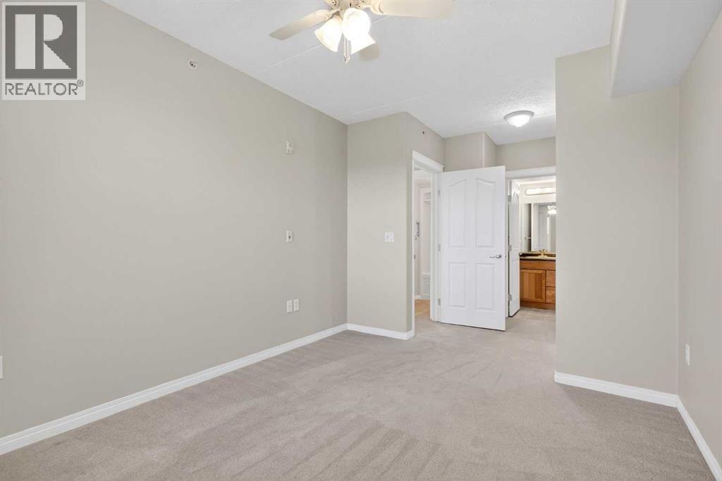 302, 400 1 Avenue SE, Diamond Valley, Alberta  T0L 0H0 - Photo 11 - A2286296