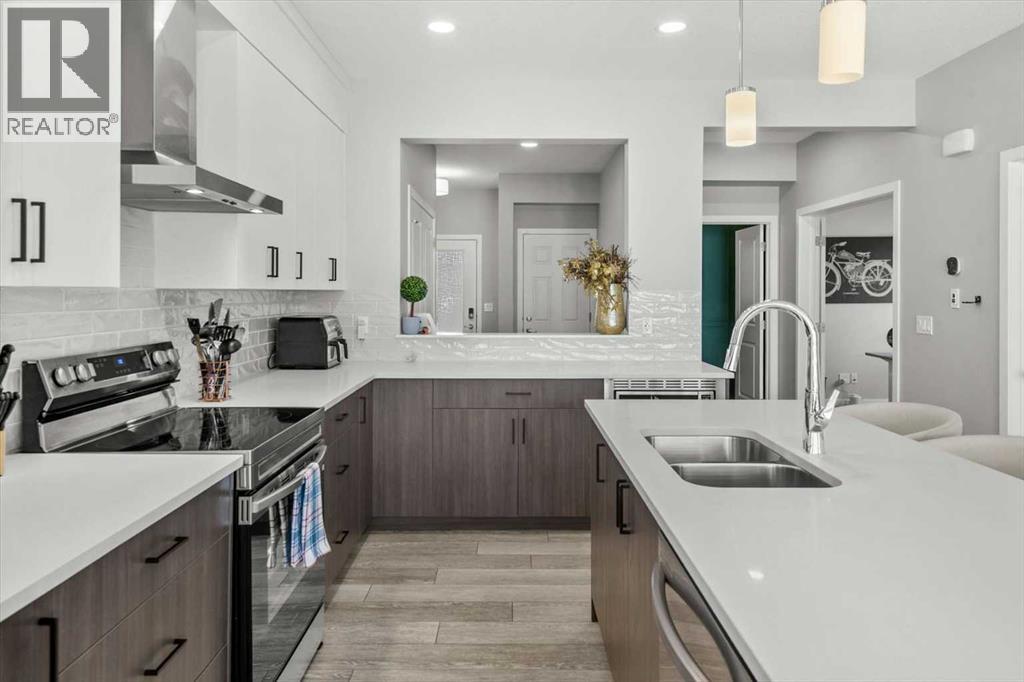 243 Silver Spruce Grove Sw, Calgary, Alberta  T2X 5M2 - Photo 9 - A2299606