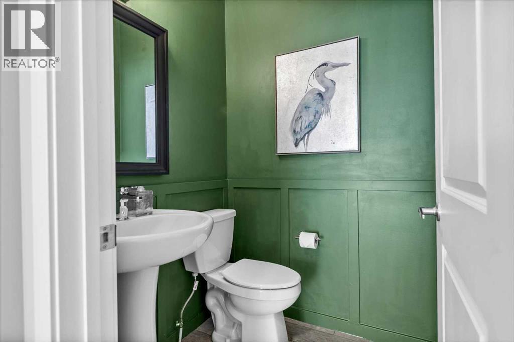 243 Silver Spruce Grove Sw, Calgary, Alberta  T2X 5M2 - Photo 5 - A2299606