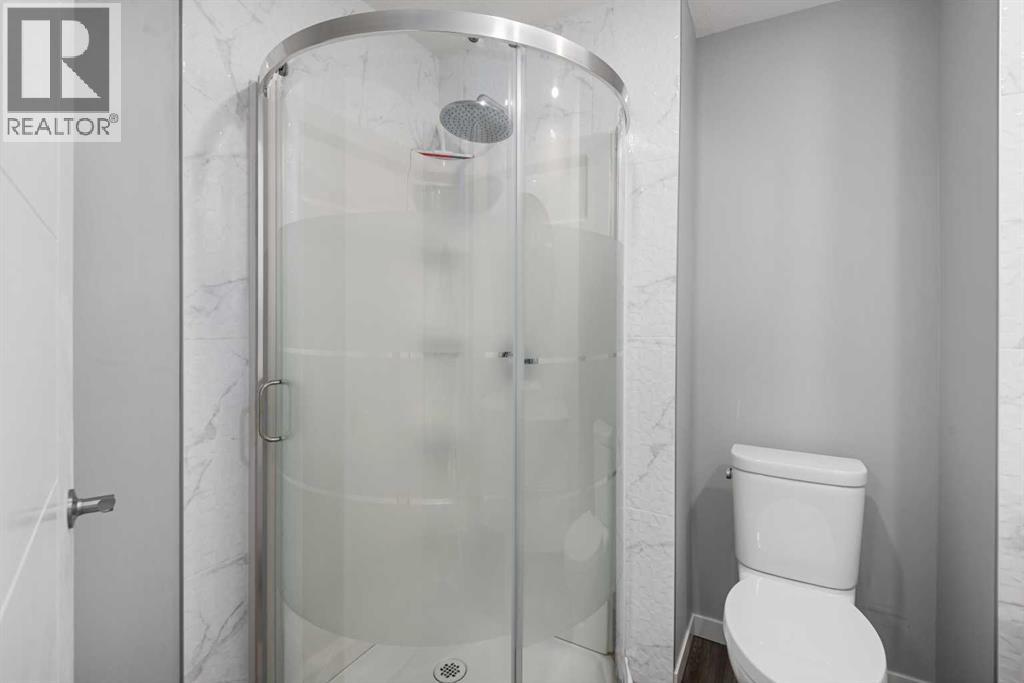 51 Woodmont Road SW, Calgary, Alberta  T2W 4L6 - Photo 23 - A2302026