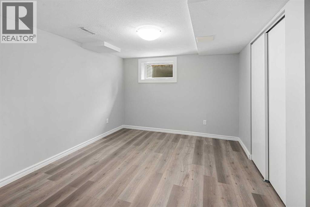 51 Woodmont Road SW, Calgary, Alberta  T2W 4L6 - Photo 31 - A2302026