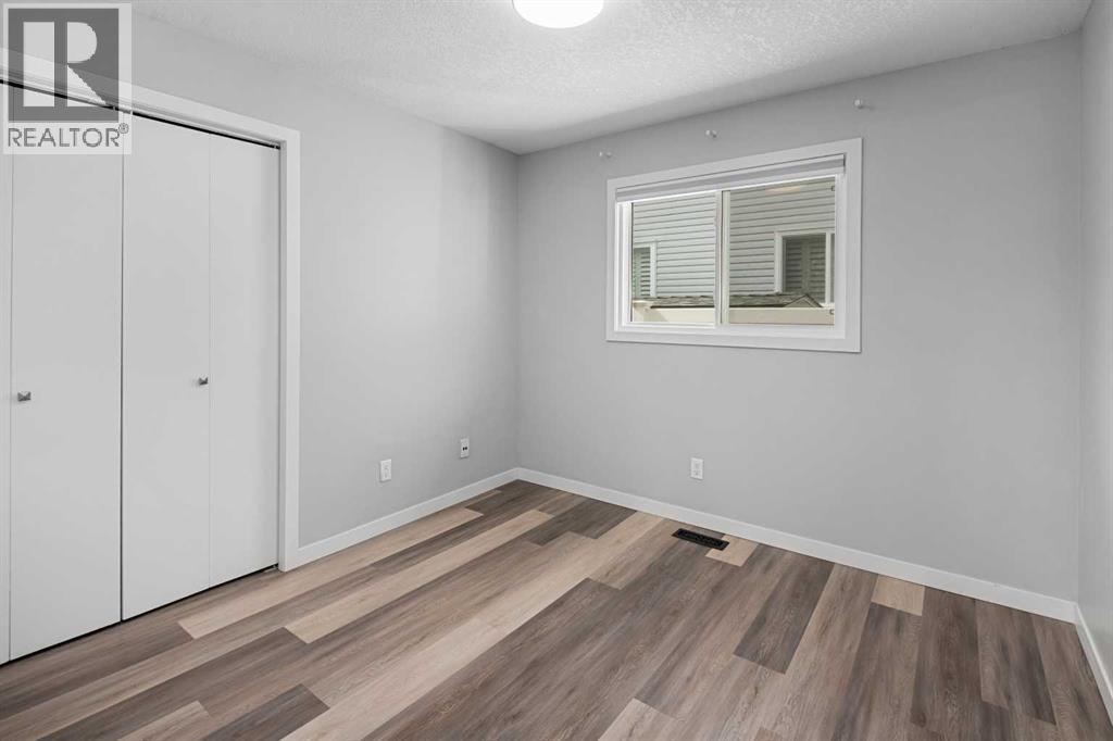 51 Woodmont Road SW, Calgary, Alberta  T2W 4L6 - Photo 19 - A2302026