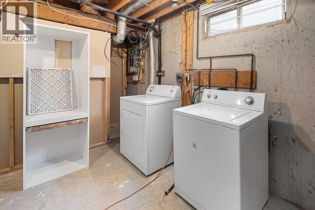 51 Woodmont Road SW, Calgary, Alberta  T2W 4L6 - Photo 35 - A2302026