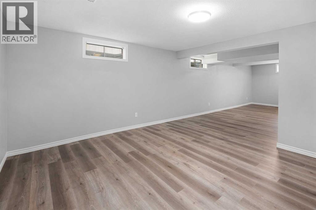 51 Woodmont Road SW, Calgary, Alberta  T2W 4L6 - Photo 29 - A2302026