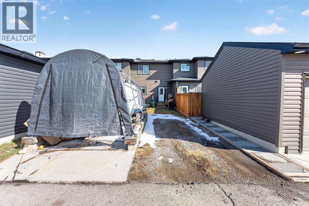 23 Belgian Link, Cochrane, Alberta  T4C 0M3 - Photo 34 - A2303290