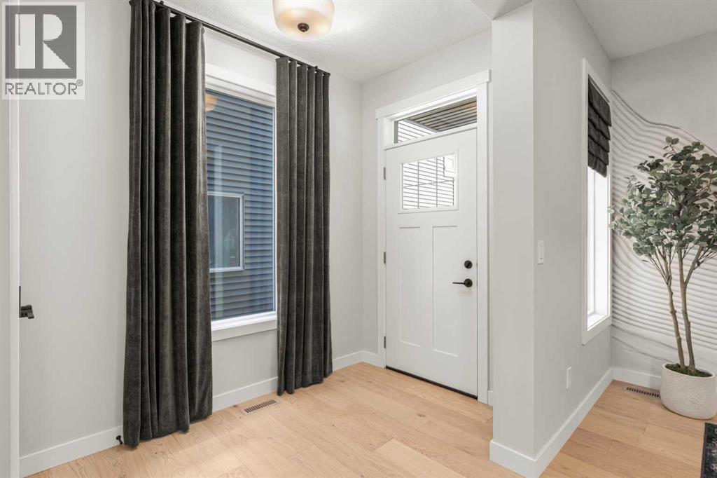 291 Rivercrest Way, Cochrane, Alberta  T4C 3E9 - Photo 2 - A2301233