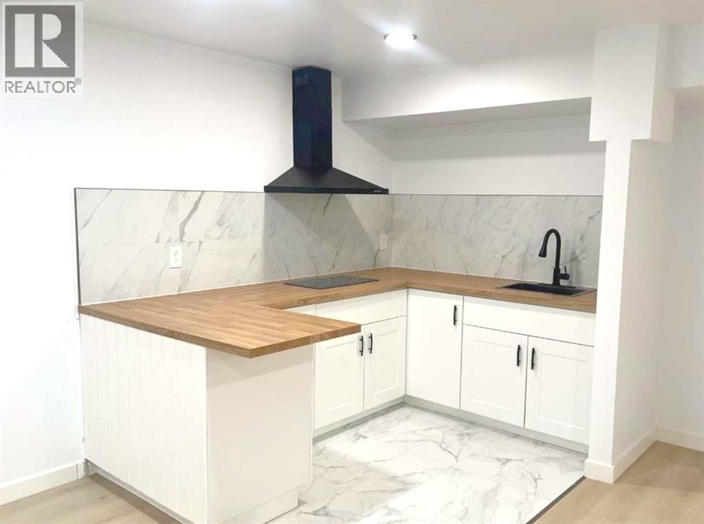 217 Coopers Grove SW, Airdrie, Alberta  T2B 0G4 - Photo 19 - A2303255