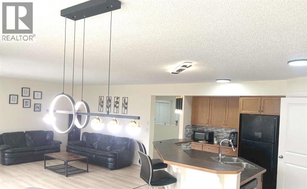 217 Coopers Grove SW, Airdrie, Alberta  T2B 0G4 - Photo 16 - A2303255