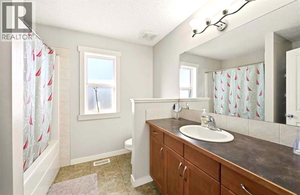 217 Coopers Grove SW, Airdrie, Alberta  T2B 0G4 - Photo 20 - A2303255