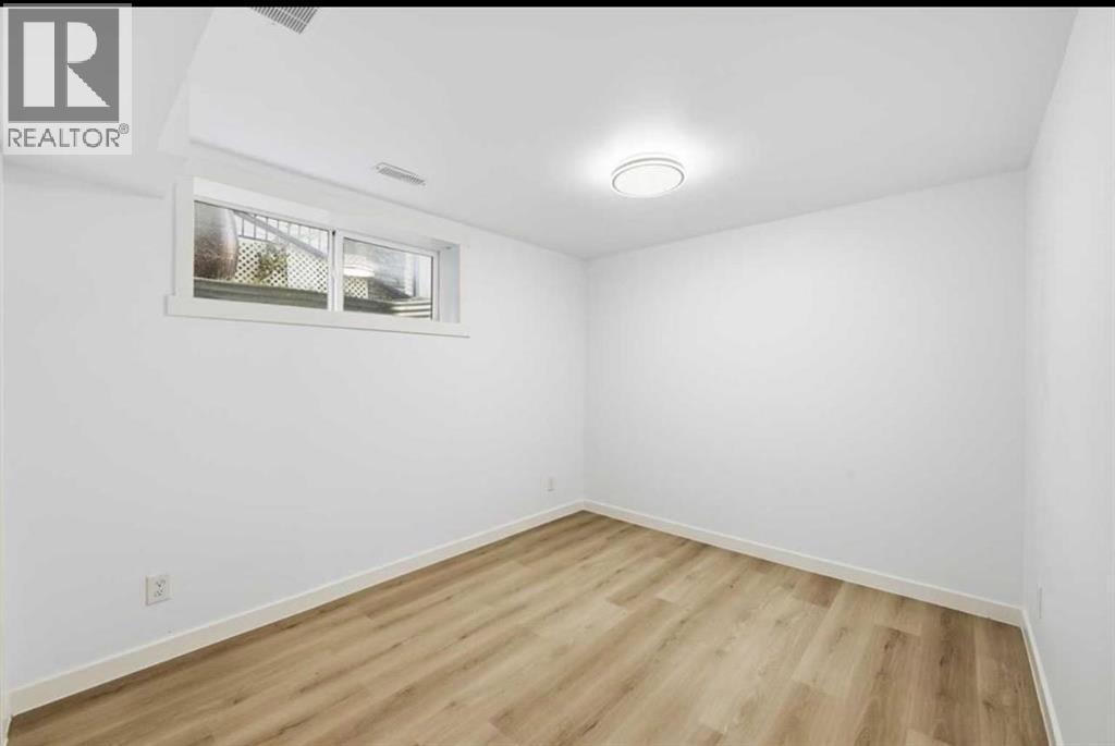 217 Coopers Grove SW, Airdrie, Alberta  T2B 0G4 - Photo 31 - A2303255