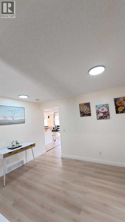 217 Coopers Grove SW, Airdrie, Alberta  T2B 0G4 - Photo 9 - A2303255