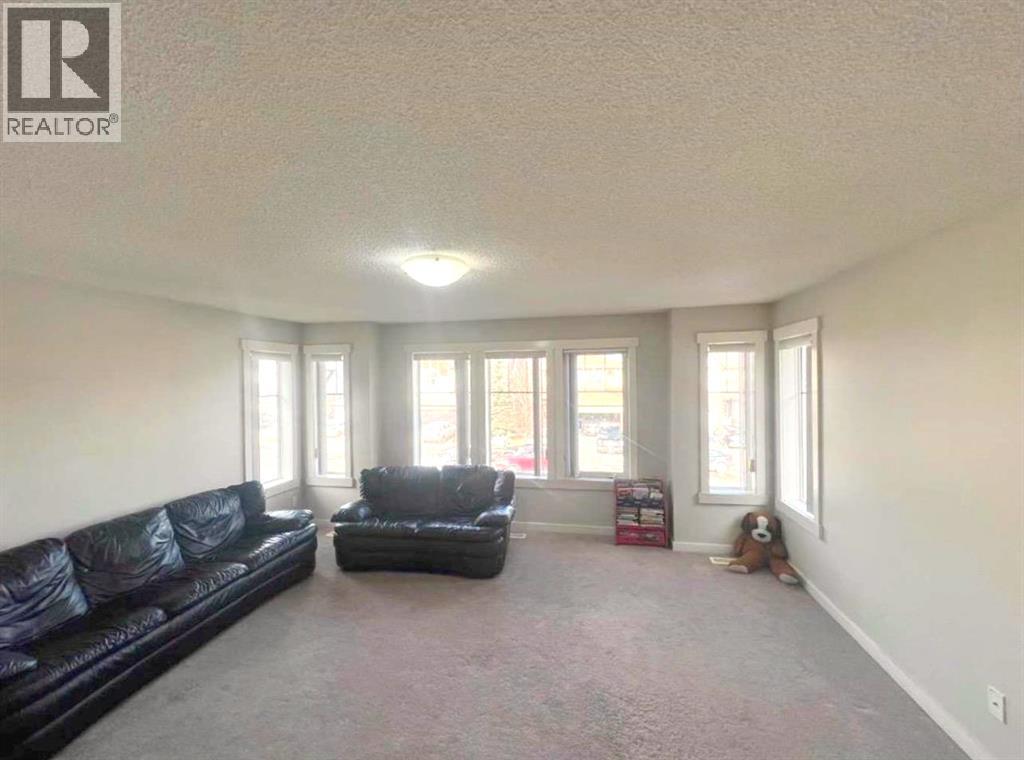 217 Coopers Grove SW, Airdrie, Alberta  T2B 0G4 - Photo 25 - A2303255