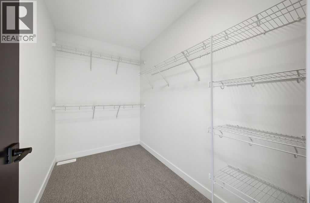 105 Heritage Boulevard, Cochrane, Alberta  T4C 3G8 - Photo 23 - A2299106