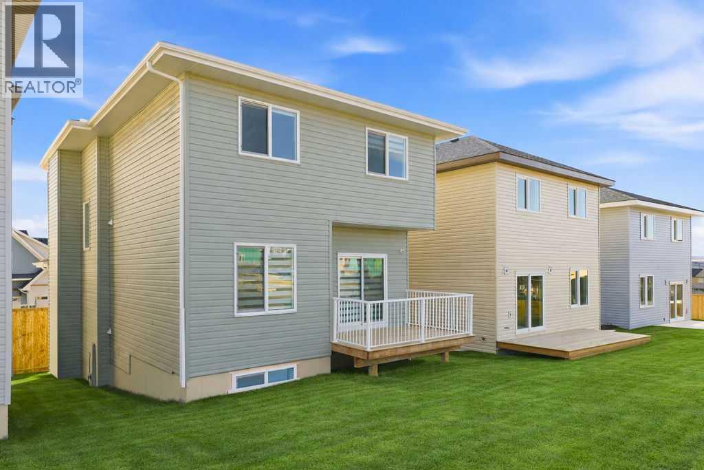 105 Heritage Boulevard, Cochrane, Alberta  T4C 3G8 - Photo 5 - A2299106