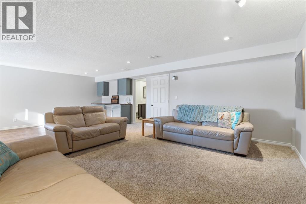 12 Crystal Shores Place, Okotoks, Alberta  T1S 2G3 - Photo 36 - A2302441