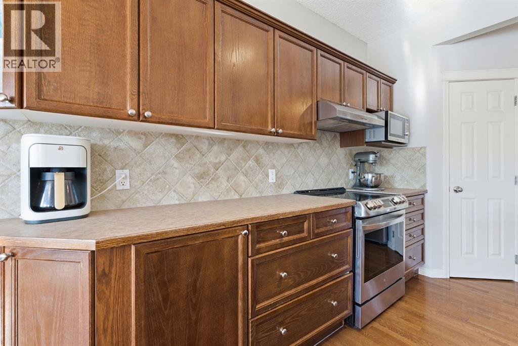 12 Crystal Shores Place, Okotoks, Alberta  T1S 2G3 - Photo 11 - A2302441