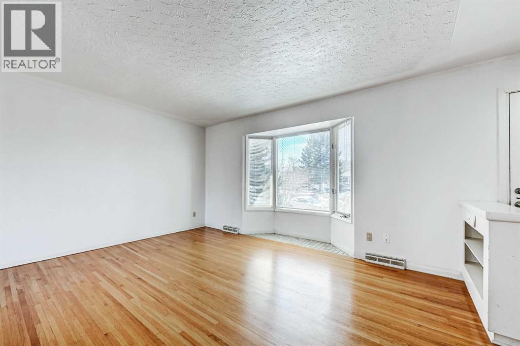 48 Westover Drive Sw, Calgary, Alberta  T3C 2S4 - Photo 7 - A2303369